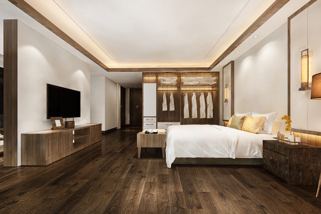 Спалня с дървен под и обзавеждане